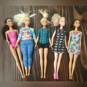 Lot of 23 Barbies.